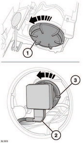 1. At the back of the headlamp unit, remove