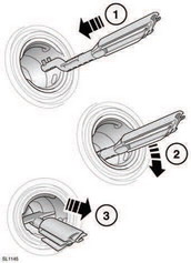 Reset the misfuel protection device as follows: